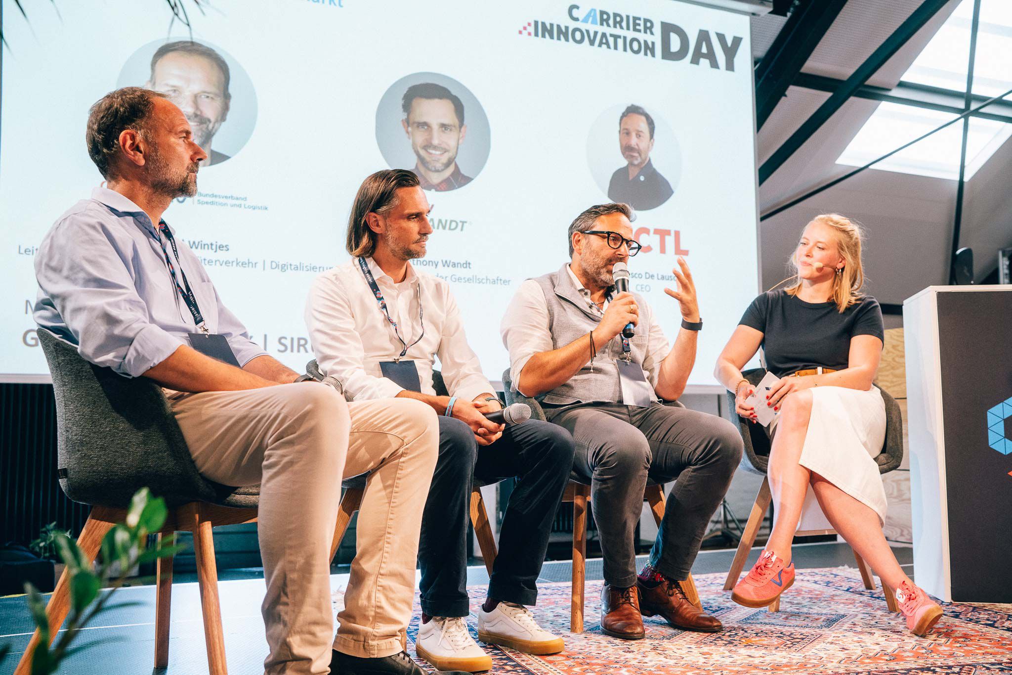 Podium auf dem SIRUM Carrier Innovation Day